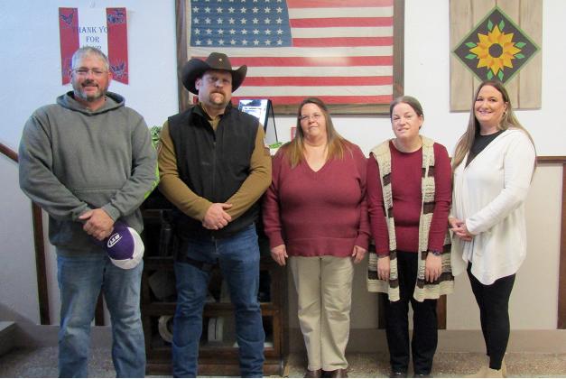 Above: Commissioner Carpenter, Sheriff Casper, County Clerk Kreutzer, Register of Deeds Leimkuhler, County Attorney Lewis. Not pictured: Magistrate Judge Korina Wedel. Left: Commissioner Jason Wells