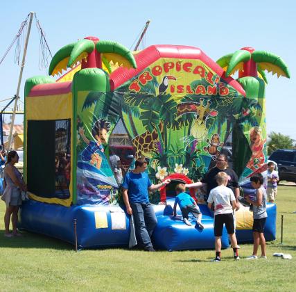 Bounce houses for the kids are popular with kids and adults.