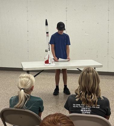 Forrest McKinney giving his rocketry project talk. Submitted