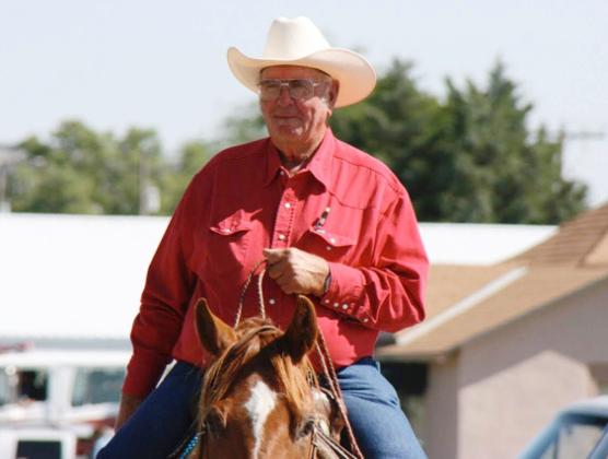 Dean Wiegers in his element as coordinator of the Wichita County Fair Parade. photo provided