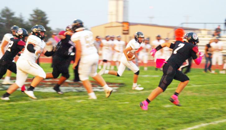 Junior Dylan Luna (7) races to cut off the opponent's rush.