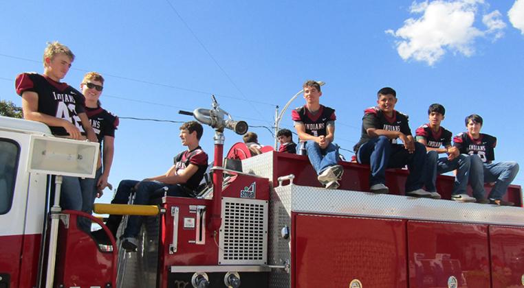 The Football team takes the Firetruck: Chase Carpenter (42), Holden Whalen (25), Huck Carpenter (33), Tyson Peters (1), Gavvan Castillo (22), Adan Plascencia (19), Ricardo Castillo (18).