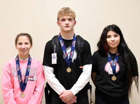 Above: WCHS State Wrestling Medalists: Jentri Porter (3rd-105), Beau Porter (6th-165), Angela Barreras (6th-135).