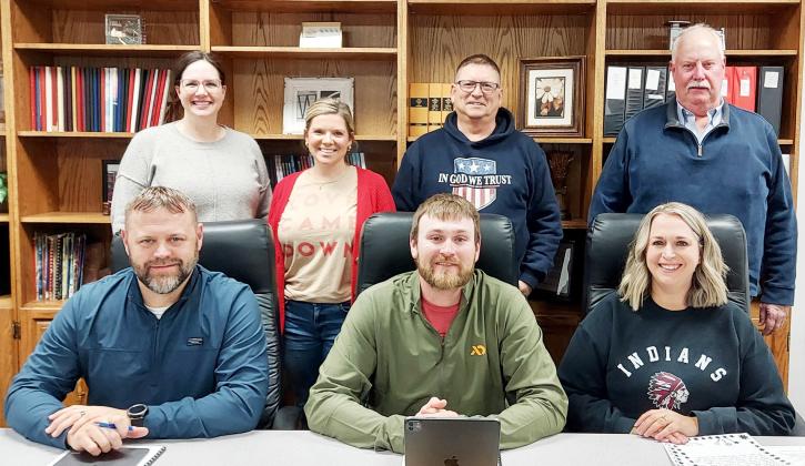 Newly-elected members of the USD 467 Board of Education joined the three incumbent members in getting to work for the district. Pictured above, back row (L-R): Maegan Berry, Eryka Smith, Bruce Loy, Farrin Watt, all new members. Front Row (L-R): Josh Young, Jesse Harbrige, Julee Beedy. Photo courtesy Tammy Mason
