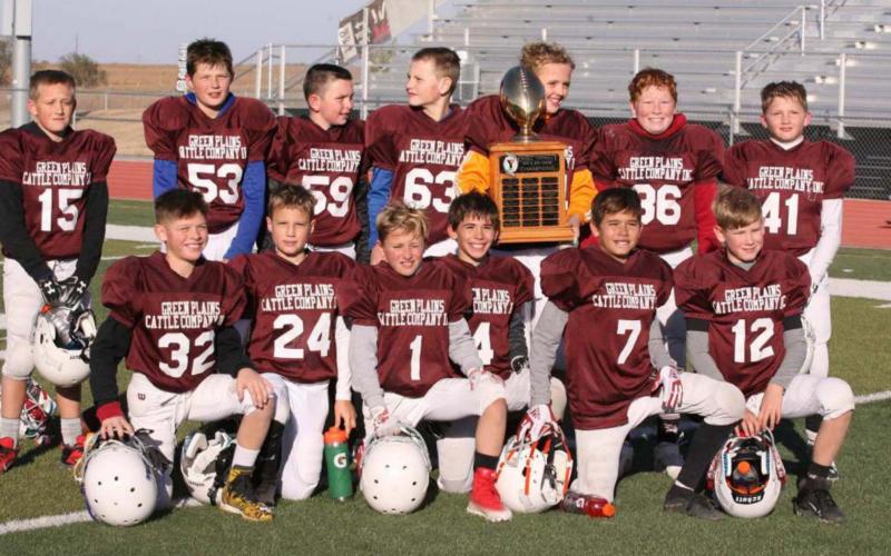 5th &amp;amp; 6th Grade tackle football team, sponsored by Green Plains Cattle Company. Back row (l-r): #15 Gannon West; #53 Greyson Owens; #59 Jaxton Fritzmeier; #84 Chase Carpenter; #36 Holden Whalen; #41 Beau Porter; Front row (l-r): #32 Jericho Ingram; #24 Jax Berry; #1 Tayson Guerra; #4 Tyson Peters; #7 Jordan Dale; #12 Quentin Koehn. Not pictured, Gavvan Castillo. Photo credit: Harbrige Family