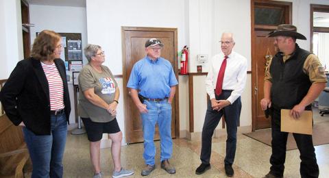 Below (L-R): Simone Elder, Executive Director of the Kansas Sampler Foundation; Pam and Tracy Rickford; Senator Moran; Kris Casper, Wichita County Sheriff.