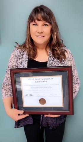 Teresa Clark, CEO of Wichita County Health Center, poses with her framed NRHA Certification. (Provided)