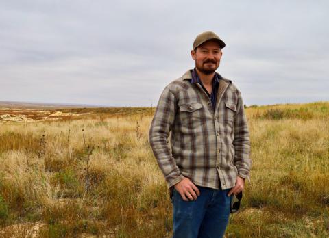 Justin Roemer manages the Smoky Valley Ranch in western Kansas for the Nature Conservancy. (Photo by Erin Socha for Kansas Reflector)