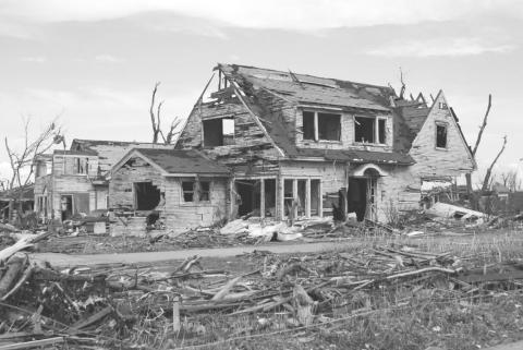 At 9:45 p.m. May 4, 2007, an EF5 tornado hit Greensburg, Kansas, destroying the town and killing 12 people. This photo, taken three days later, shows typical damage. (Max McCoy/Kansas Reflector)