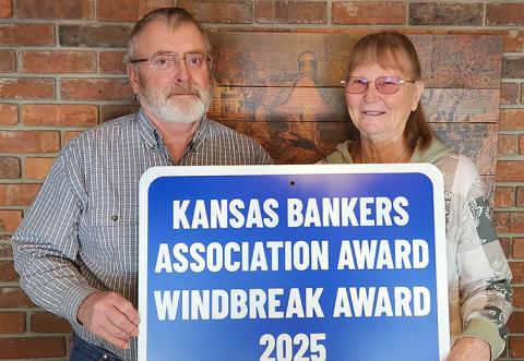 Greg and Linda See display their 2025 Kansas Bankers Association Windbreak Award. (Provided)