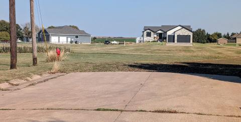 This dead-end street will be extended as part of a new housing development in Hoisington. (Photo by Dale Hogg for Kansas Reflector)