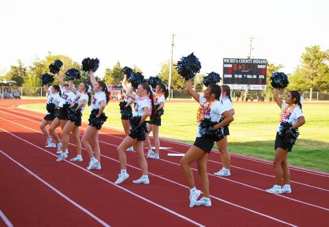 The WCHS Cheerleaders get the crowd in the spirit before the game starts. All football photos by Dave Breitkreutz, WCNS staff