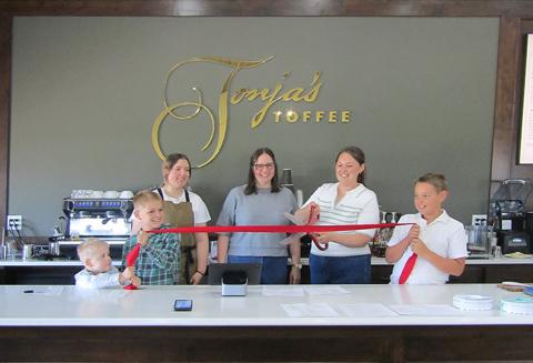 Above (L-R): Ledger Horton, Axel Horton, Hayden Horton, Maegan Berry, Aubrey Horton, Kaladin Horton are all smiles as Aubrey cuts the ribbon.