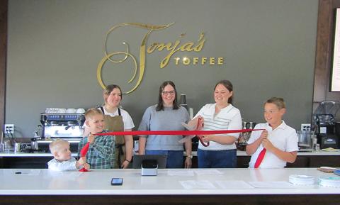 Above (L-R): Ledger Horton, Axel Horton, Hayden Horton, Maegan Berry, Aubrey Horton, Kaladin Horton are all smiles as Aubrey cuts the ribbon.