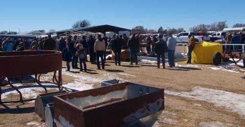 Despite Swampy Conditions Auction Draws Large Crowd