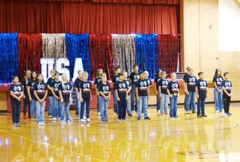 WCES students prepare to honor veterans with a performance at their Veterans Day program.