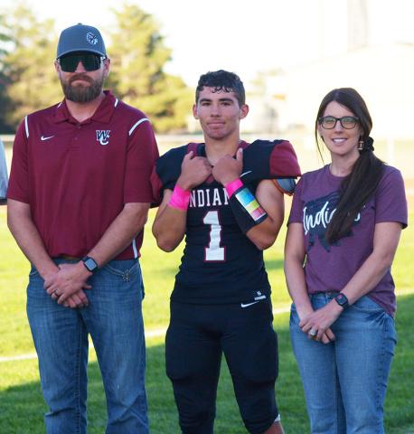 Tyson Peters, Son of Jesse and Kristin Harbrige, and Steve Peters.