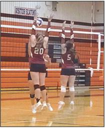 Jenn Koehn and Jayah Case block against Southwestern Heights offense. Photo: Jessica Case
