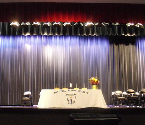 The stage is set to induct new members.