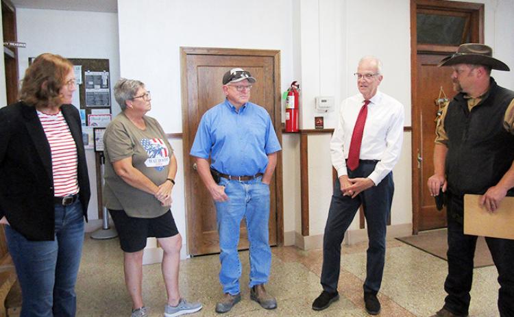 Below (L-R): Simone Elder, Executive Director of the Kansas Sampler Foundation; Pam and Tracy Rickford; Senator Moran; Kris Casper, Wichita County Sheriff.