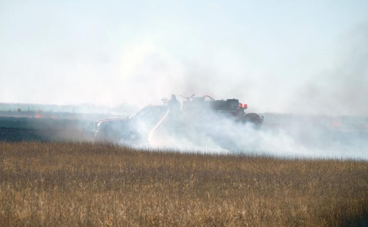 Dried brush, weeds, and stubble make great fuel for a quick-moving fire, as Lydia residents and commuters were reminded Wednesday last week. A passing semi-truck was the cause of the excitement, as the sparks and errant flames from a blown tire ignited roadside kindling.
