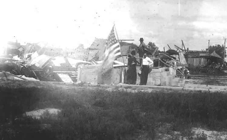 Above: The remains of the M. E. Church, which had just undergone an extensive and painstaking renovation. This is approximately from Broadway west of 3rd street looking east; o the left, out of frame, would be the Washington House.