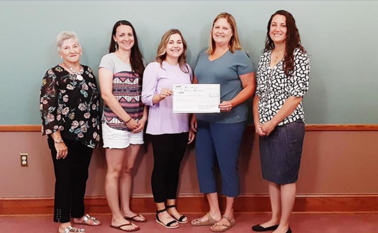 Pictured above, left to right: Dorene Reimer, HSPS Executive Committee; Jenny Long, Treasurer of Childcare Board; Aimee Baker, Vice-President of Childcare Board; Robyn Tokoi, Childcare Board member; Nikki Bjurstrom, Childcare Board &amp; WC Economic Development Director. Photo courtesy Dorene Reimer
