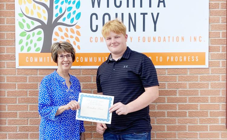 Brandon Price receives the Jim &amp; Judy Biel Memorial Scholarship