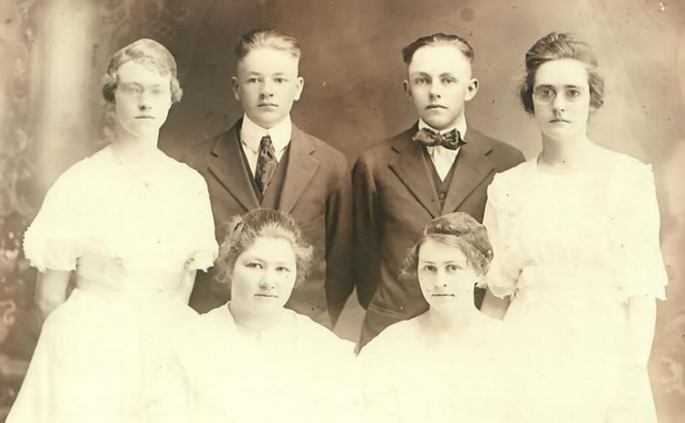 Above: WCHS 1918 Graduating Class: Back Row, L to R: Aletha (Walk) Waymire, Howell Rees, Earl Robison, Inez (Henry) Bishop. Front row, L to R: Esther Lutz, Adlee (Wilson) Clark) The back of the photo gives the graduates’ names and the following information: Picture given by Mrs. Ethel Scott, teacher in high school. Eliza Atkinson, Oct.1966.