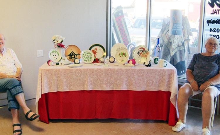 Above: Sisters Bernice Crouch and Jeanene French display Bernice's hand-painted china.