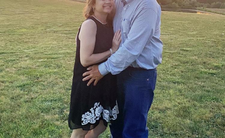Michelle and Craig Sheppard, pictured here in front of a gorgeous sunset, are the 2021 Parade Grand Marshals. Submitted