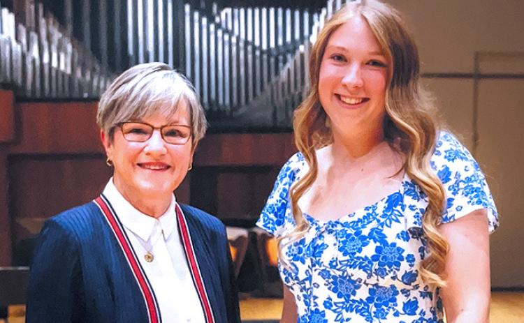 Governor Laura Kelly and WCJSHS Valedictorian Clara Koehn pose for a photo at the 42nd Annual Governor's Scholars Awards Program banquet on May 4