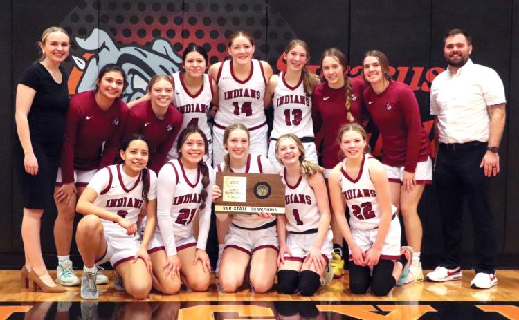 Left: Th e WC H S G i r l s Basketball 2A Sub-State Champions pose with their shiny new trophy. Back Row (L-R): Asst. Coach Kelyn Kiser, Venesa Jimenez, Emma Berning, Sammy Medina, Sidney Biermann, Clara Koehn, Audrina Marcy, Maddie Myers, Head Coach Bryce Nickelson. Front Row (L-R): Jasive Hernandez, Erika Terriquez, Megan Ricke, Ashlynn Ricke, Breanne Ricke Photo courtesy Sara Brown