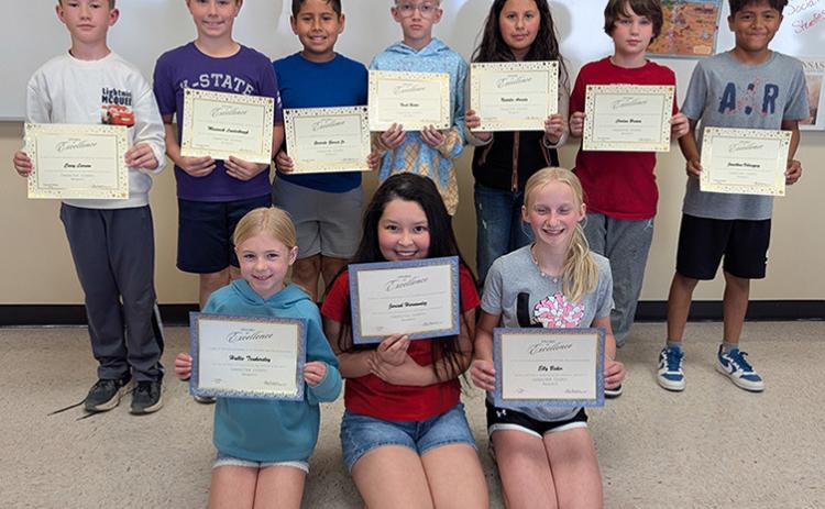 (Back Row) Honorable Mention in no particular order - Cauy Larson, Maverick Louderbaugh, Gerardo Garcia Jr., Nash Baker, Natalie Arrieta, Cordan Brimm, and Jonathan Sanchez-Valasquez. (Front Row) Respect Essay Winners: 1st Place, Hallie Tankersley; 2nd Place, Jairah Hernandez, 3rd Place, Elly Baker Photo courtesy Andrea Bauck
