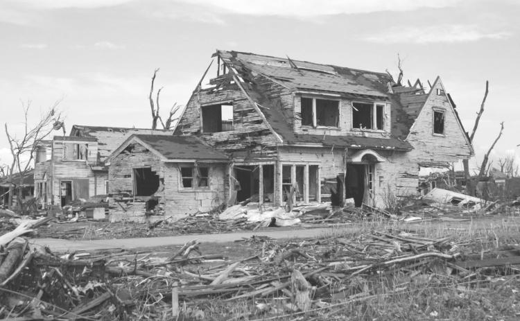 At 9:45 p.m. May 4, 2007, an EF5 tornado hit Greensburg, Kansas, destroying the town and killing 12 people. This photo, taken three days later, shows typical damage. (Max McCoy/Kansas Reflector)