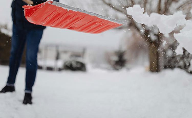 When removing snow this winter, consider ways that don't require picking it up and throwing it, says K-State climatologist Chip Redmond.