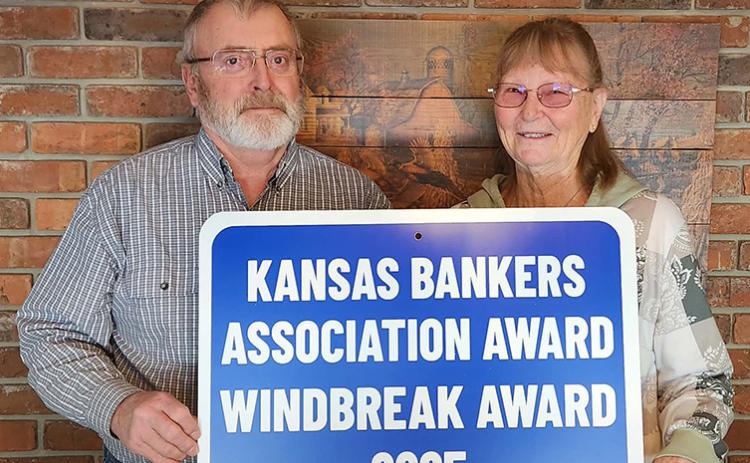 Greg and Linda See display their 2025 Kansas Bankers Association Windbreak Award. (Provided)