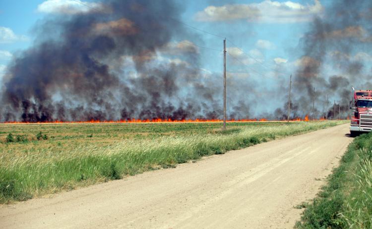 Leoti Volunteer Fire Department Battles Wheat Field Fire in South of County