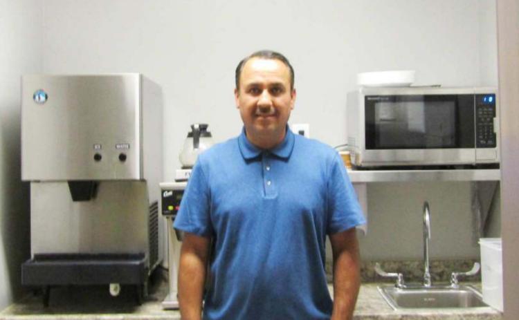 Pictured above in the new kitchenette is Nelson Delacruz, who took a lead role in the refurbishment. Staff Photos