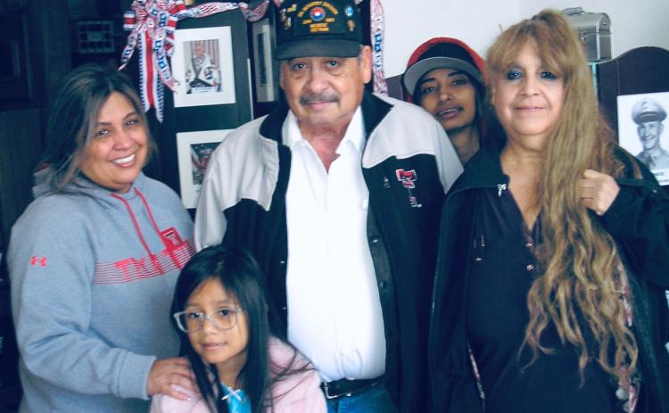 Above: Isaac Barraza surrounded by the women in his life (L-R): daughter, JoAnne; great-granddaughter, Haley; granddaughter, Avery; wife, Rose Mary. (Provided)