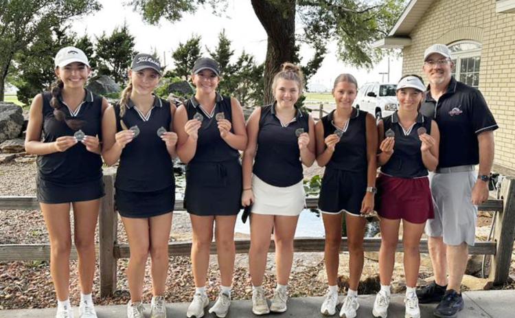 Hugoton - Sophia Wedel, Audrina Marcy, Katelyn Thurman, Kimberly Meyer, Evy Thurman, Jentri Porter, Coach Brown Photo by Janee Porter