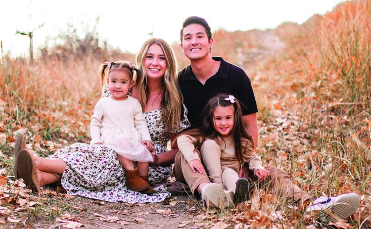 The Litster family: J.J. and Samantha, with their two daughters, aged 2 and 4. Provided