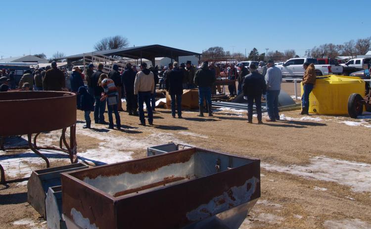 Despite Swampy Conditions Auction Draws Large Crowd