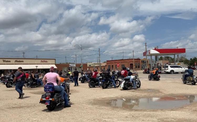 Participants in the Tri-State Coalition of Concerned Motorcyclists fundraising drive to benefit DJ’s Toy Fund for Sick Children prepare to depart the Leoti Eagle Store for the next leg of the circuit. Riders traveled from Oakley to Scott City, to Leoti and Tribune, then to Sharon Springs and Winona to raise funds and awareness. The second-annual event raised over $2,900.