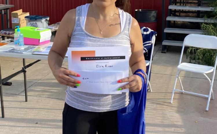 Elvia Rivas got first place for the women’s division, High School graduate and above.