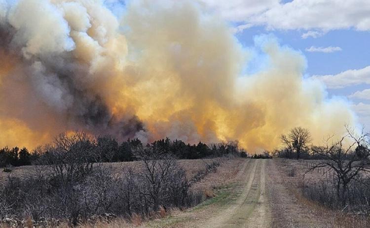 Right: Wildfires have forced evacuations near Ashland as firefighters work to contain Meade County fires that have burned nearly 93,000 acres. (Kansas Forest Service)