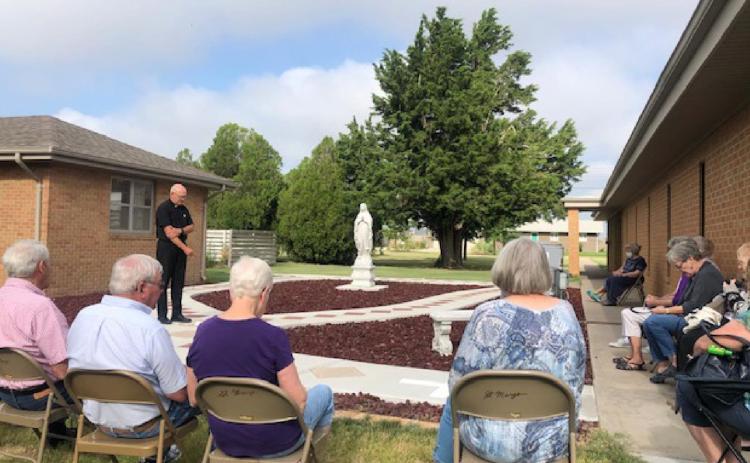 Parishioners Pray Rosary