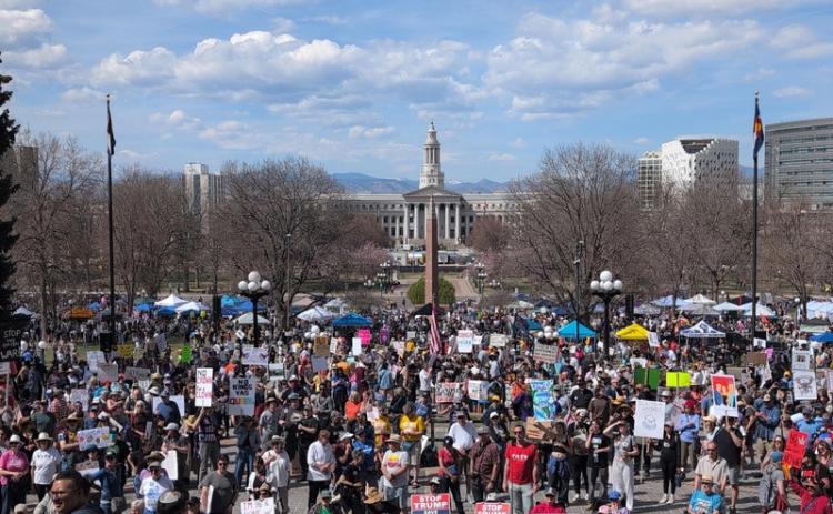 No Kings demonstrators began gathering at noon Saturday on the west side of the Colorado Capitol. Local organizers expect as many as 70,000 people to attend the protest in Denver. (Photo by Andrew Fraieli/Colorado Newsline)