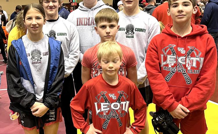 Above: Takedown Club district wrestlers. Back row (L-R): Brandon Price. Second row (L-R): Wyatt Gardner, Beau Porter. Front row (L-R): Jentri Porter, Tayson Guerra, Tyson Peters. Front: Journey Langdon.