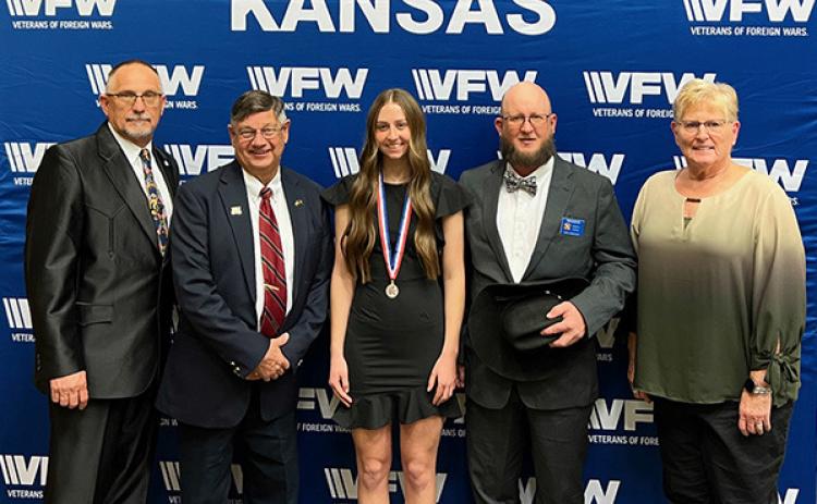 Kansas Department Commander James Langley; 6th District Commander Jerry White; Addi Simons, 6th District Voice of Democracy 1st place; 6th District President Garrett Steggman, Department Scholarship Chairman Kim Butcher. Photo Provided.
